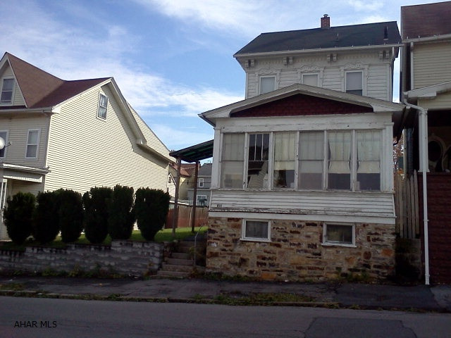 Handyman special.  Large double lot.  Good roof and furnace.  Selling as-is.