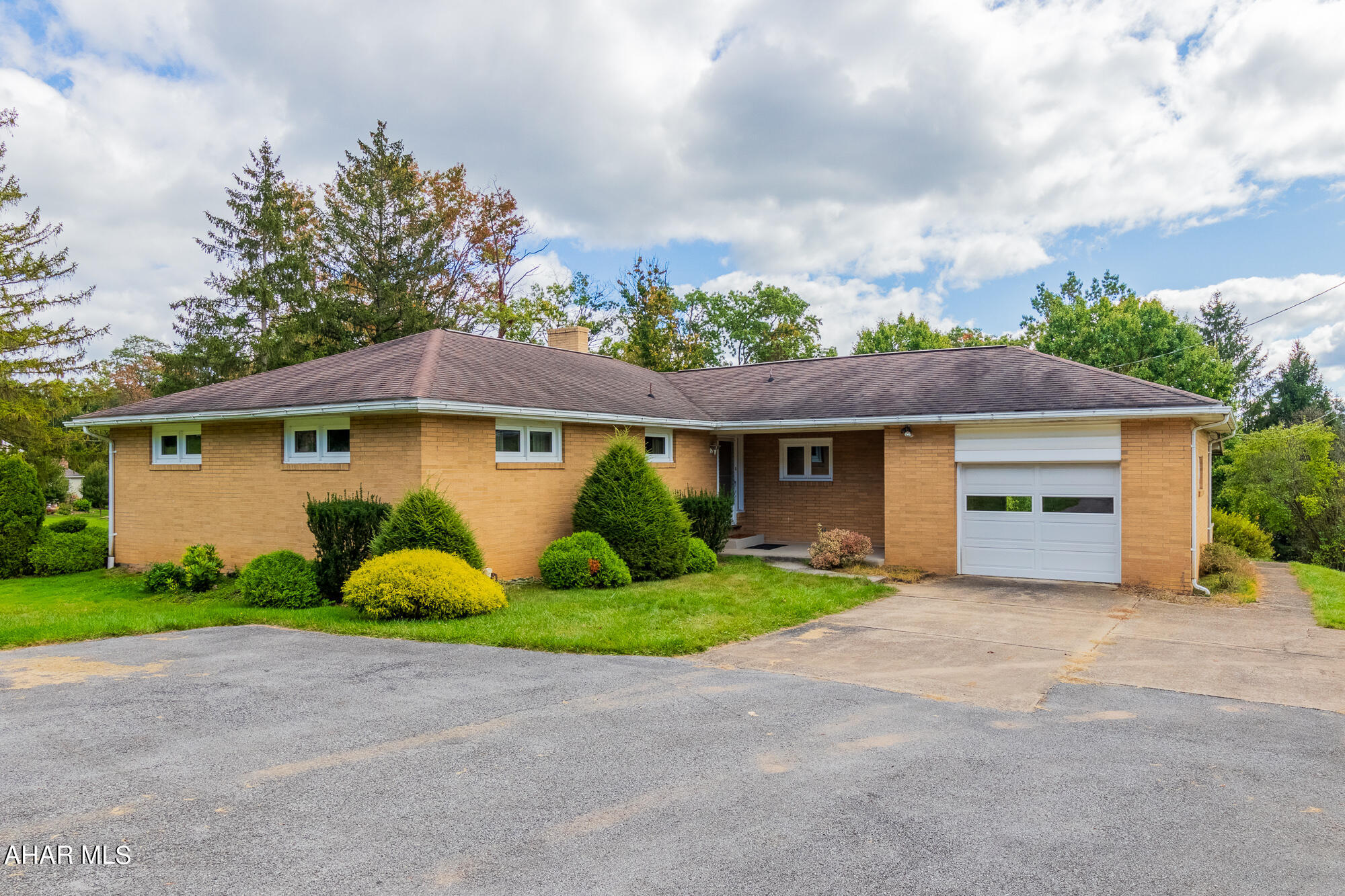 My advice to you is..don't miss out on this one story brick home with finished basement and .98 acre of ground. Home is located in Sylvan Drive area, with two finished floors, first floor has kitchen with eating area and Living Room with dining area, 3 bedrooms, 2 full baths 1 & 2 flr. Basement has walk out and large family area, with hobby space (used as a sewing), H/W Flrs. Private setting.