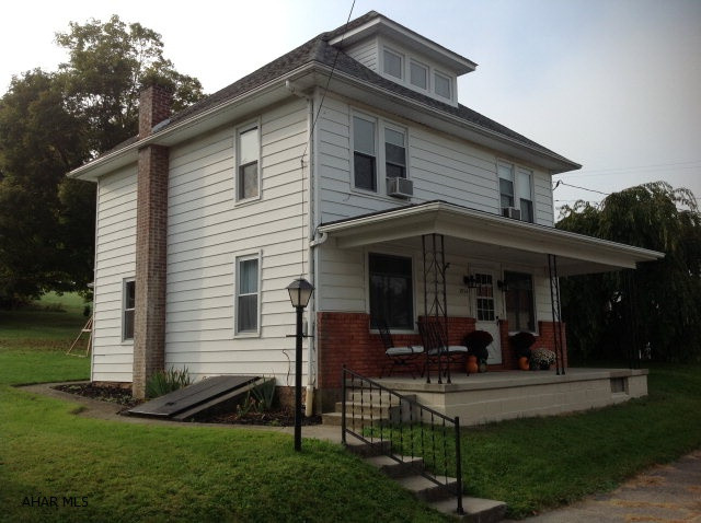 Well Maintained and nicely renovated with newer updates 2 story 3 bedrooms, 1 bath home.  Beautiful hardwood floors throughout. A nice 24x6 large front porch and 19x7 screened in back porch. Detached oversized 2 car garage/workshop and spacious backyard for gardening or just enjoying the outdoors.