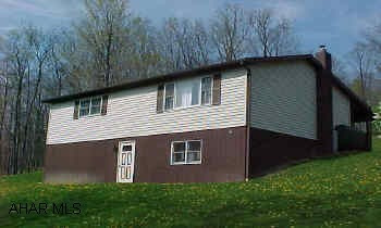 Very nice home. Immaculate. Finished basement with Nestor Martin wood stove. Room for extra bedroom, 2 acres fenced for horses, 3 stalls in barn & room for car. Friendly dog, Choc Lab "Franny"