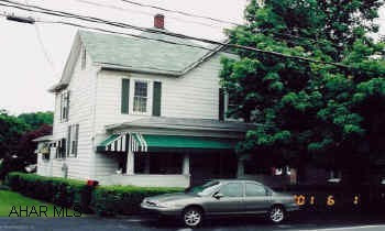 Very attractive 2 story. Remodelled and ready to move into. Hardwood floor, plaster walls, new windows, roof and vinyl siding.
