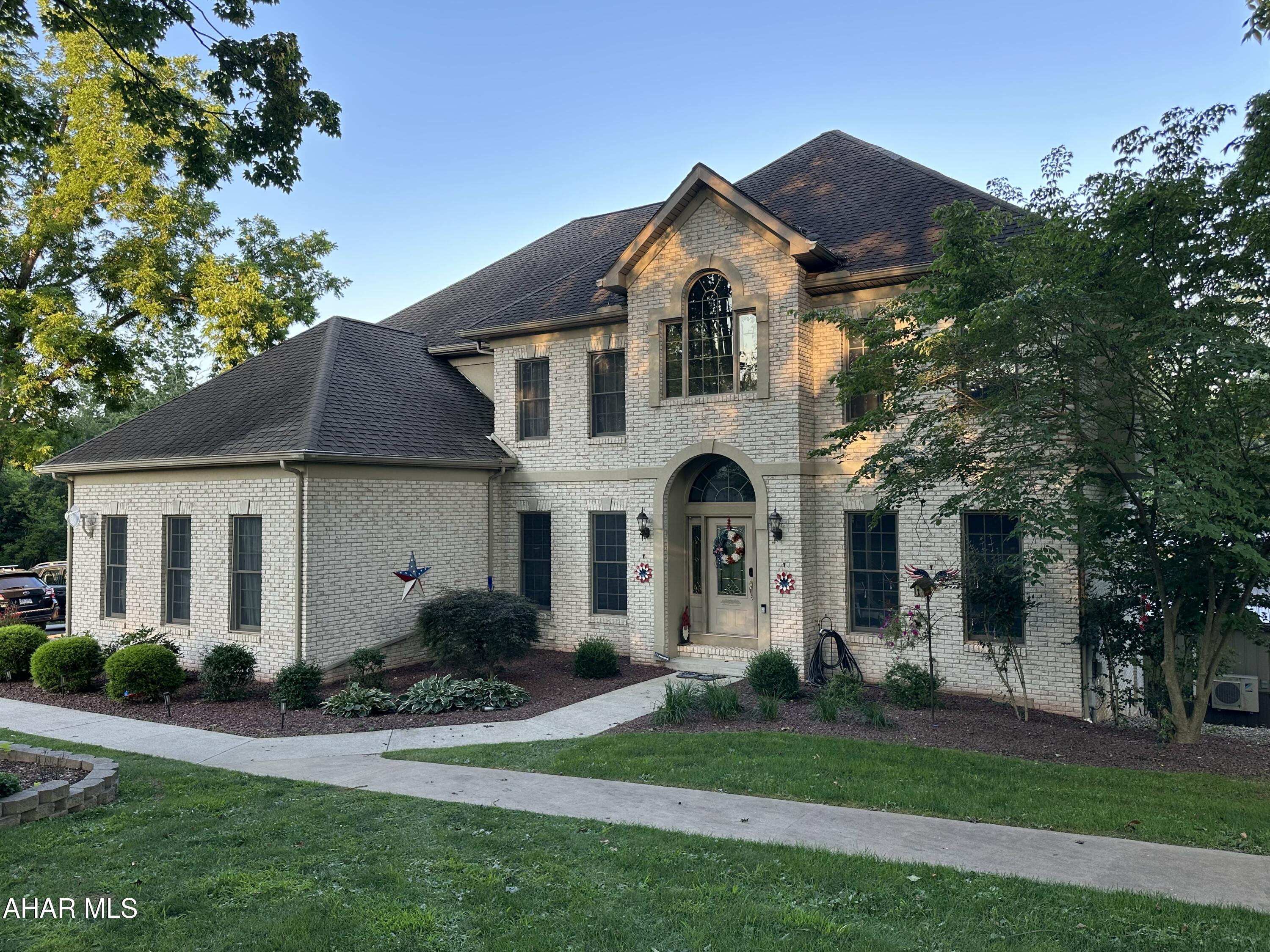 Who says you can't have it all? Check out this beautiful property adjacent to the American Legion Country Club in Mount Union. This home is a quality two story home with 5 bedrooms and 5 full baths, a two story foyer and family room, formal dining room with tray ceilings, formal living room, a custom cherry chef's kitchen, attached three car garage, one bedroom is on the main floor with an adjacent full bathroom, a catwalk separates the second floor providing privacy and a beautiful view of the family room and fireplace below. The basement is finished with a theater room in the basement with the equipment staying, a full bathroom, a wet bar and two Presidential Liberty gun safes. The basement opens at ground level to the pool and spa area. The exterior of the house boasts a huge back deck overlooking the inground heated pool, spa house with an Arctic jacuzzi and Arctic swim spa, and a heated steel pole building with a/c and kitchen that is perfect for entertaining in any weather. Additional outbuildings include: a 60x80 building with a 16x32 garage door, finished office area with mini split and a half bath, shelving included, propane radiant heat and forced air heat; a detached two car garage with finished area on the second level and pool table; a two car detached garage with a third garage door on the side for easy access. This home has two geothermal heat pumps. More pictures to follow the owner is in the process of moving.
