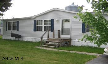 Champion double wide. Champion double wide on large, rented lot.  Great kitchen and bathrooms.  Lot Rent $180.00/month.