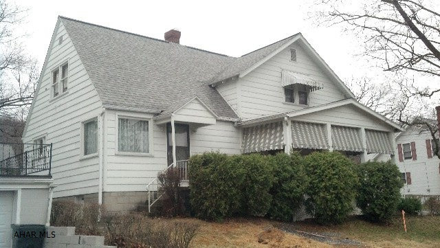 Great opportunity!  Really versatile depending what you want!  Commercial location- duplexed structure.  One side is a residence in move-in condition, the other side has been an apartment and a beauty shop... Could be renovated and used as a business office.   Great location- many possibilities.  Live in one side and hold your office in the other side!  Rent one side, or the entire duplexed property!