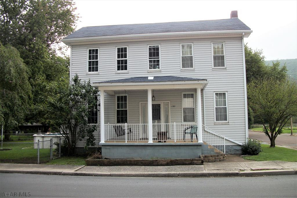 This spacious house, built in 1900, is currently being remodeled. It has a mixture of the old, with 9 foot ceilings in the office and dining room, and some of the new including an updated kitchen with a corian sink. The living room features a stone fireplace, LED lighting and plenty of space to spread out and relax. The large rec room contains around 700 sqft of area; plenty of room for a ping pong or pool table, and also contains the laundry area. There are 5 bedrooms and 2 bathrooms upstairs that are being updated or remodeled. The attached garage has the room for 4 cars, or 2 cars and a large RV. The auto lift is a definite plus for the DYI mechanic. The level, double lot is partially fenced & contains an above ground pool for cooling off in the summer.