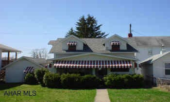 2 story, aluminum sided, 3 BR, 2 Bath, attached garage, C/A, newer furnace and roof Property being sold as is, clean out will be at buyers expense. No power, take light to show.
