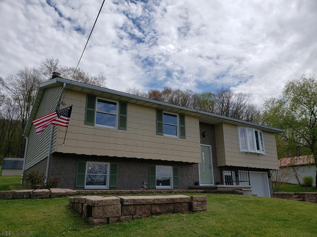 3 bedroom, 2 bath home in a rural setting in the Hollidaysburg school district. New carpet and paint on the main level. Harman pellet stove in family room on main level is included. Lower level family room with wood burning fireplace and full bath could be a great rec room/entertainment area.   .56 acres country living just minutes from the borough! View our 3D VIRTUAL TOUR!