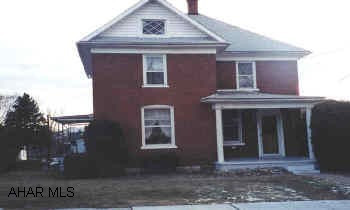 Two-story brick with 4 bd. 2.5 ba in the borough of Roaring Spring Priced to sell!! Must see inside. First floor addition with large master bedroom and bath with whirlpool tub. Also family room with fireplace. Close to playground.  REDUCED TO $69,000