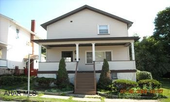 NICELY UPDATED 2 STORY HOME WITH 3 BEDROOMS, UPDATED FULL BATH, SUPER HIGH EFFICIENCY NATURAL GAS FORCED AIR FURNACE ON LARGE CORNER LOT. CALVERT HILLS AREA!  NICELY UPDATED 2 STORY HOME WITH 3 BEDROOMS, UPDATED FULL BATH, SUPER HIGH EFFICIENCY FURNACE, OAK KITCHEN, 1ST FLOOR LAUNDRY FACILITIES, ON A LARGE CORNER LOT!  HOME WARRANTY!  CALL MIKE MANGIA 932-8888.