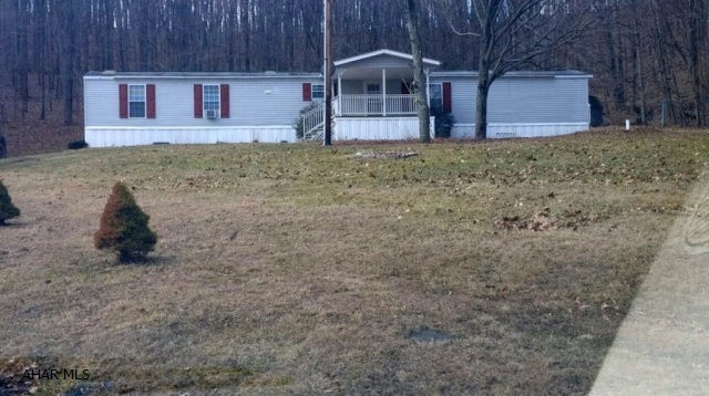 Single wide home with split floor plan, two bedrooms and two full baths in very good condition! Large eat in kitchen, skylights and a garden tub. One covered porch and a rear deck. Enjoy complete privacy on little over an acre near State Game Lands in Buffalo Mills.