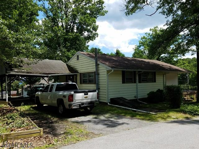 *PRICE REDUCED* One story living in the very desirable Juniata Gap area of Altoona. This 3 bed 1 bath home would be a perfect starter home or downsizing. Hardwood throughout main floor under the carpet. Newer roof, furnace, water heater and a two car carport. Beautiful yard on a corner lot you get the feeling of seclusion only 5 minutes from town whats not to love! Call for your private showing today!