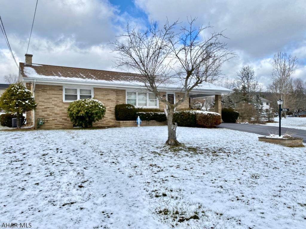 Solid and well cared for brick ranch on big .66 Acre lot in Eldorado. This adorable 1 story home has a nice open floor plan,Beautiful hardwood under carpet, big closets, and plenty of counter and cabinet space. Lower level is a wide open entertainment room with a bar area and separate utility and laundry room. 3/4 bath in the basement, Central Air, oversized driveway, carport, updated mechanics and roof, front porch, shed, and even a great view! All in a great location of Logan Twp. Put your decorative juices to work and make it yours today!