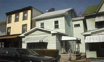 3 bedrooms, hardwood floors, vinyl siding, fenced yard, close to everything Nice starter home.