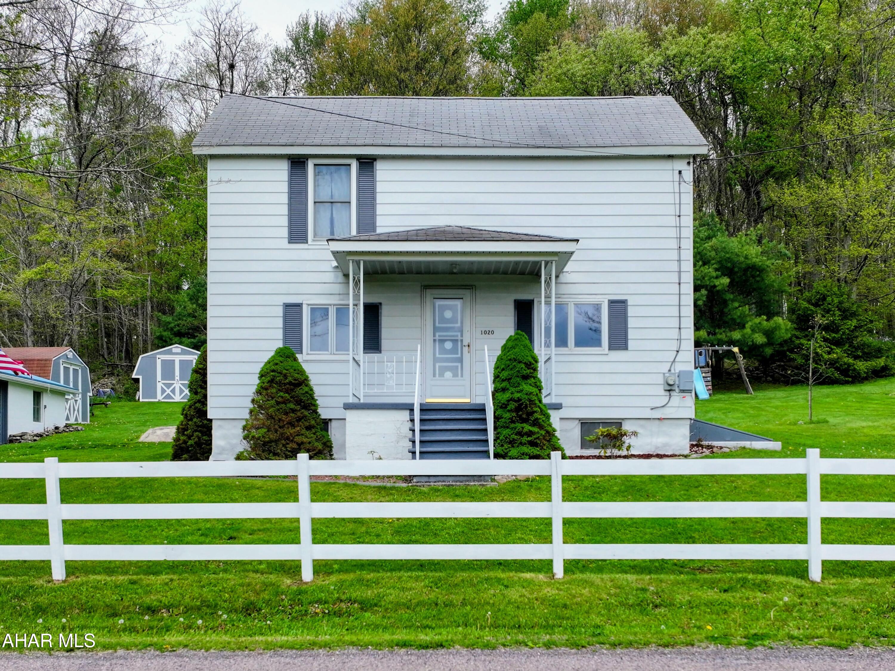 Enjoy country living with this 2 story farmhouse set on 3.88 acres in Somerset School District. This property offers a nice mix of open yard and wooded space with plenty of room for the entire family. A nice sized 2 car detached garage is perfect for everyday use or hobbies, and the covered back deck is perfect for summer dinners or unwinding at the end of the day. The backyard provides a nice setting back up to the woods and even a kids play set already in place. Inside, the home features 3 bedrooms and 1 bath, including one bedroom on the main floor for added convenience. The kitchen is spacious and comes with appliances included.  Rounding out the first floor is space for a full dining table and a nicely sized main living room.  New flooring throughout and a refinished hardwood staircase add a fresh feel while still keeping the home's character. This wonderful home offers the best of both worlds, a peaceful country setting while still being just minutes from town, making it easy to enjoy privacy without sacrificing convenience. Give us a call today to make this house your new home!