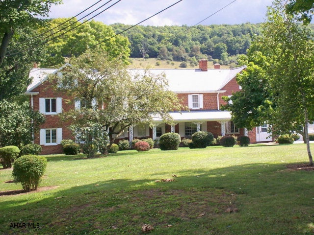 Classic elegant 2.5 story estate home on 172 acres located just a few minutes from downtown Bedford, PA. Large formal rooms, 8 fireplaces, 5 bedrooms, 6 baths, over 6,000 square feet. Beautiful views overlooking inground pool and 1.7 acre stocked pond. 108 acres of open land, 37 acres of woods and 29 acres of mountain ground. Large barns, storage building, pool house and brick picnic house, 4 bay brick garage with 3 bedroom apartment. Qualified buyers by appointment only, no drive bys.