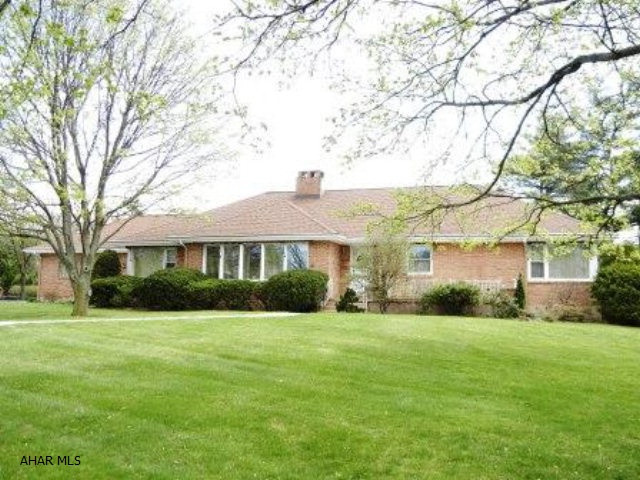 Abolutly lovely, large Brick one story on over 1/2 acre. Gorgeous hardwood floors throughout. Very large rooms. Storage galore. Very bright and cheery due to many large windows.Enjoy the beautiful yard from your screened in porch or your open porch. New furnnace. A must see! Home warranty included.
