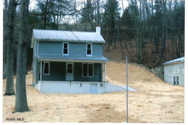 This country home sits on 2.93 acres and has been completely renovated. Small and cozy with a huge yard, detached garage that needs some work. Sit on the front porch and enjoy the countryside. Home has two bedrooms and one full and one half bath. Newer furnace and roof. Excellent buy!