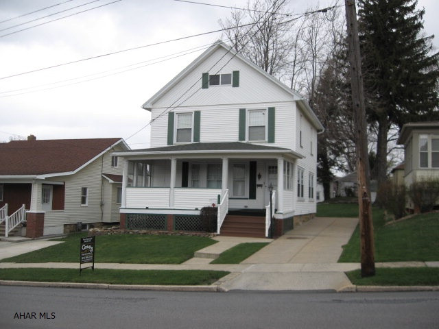 Spacious 4 bedroom 2 bath home in Cresson w/ that country feel! Walls and ceiling have been replastered, heated basement, laminate flooring, gas fireplace. Newer vinyl siding, large covered porches