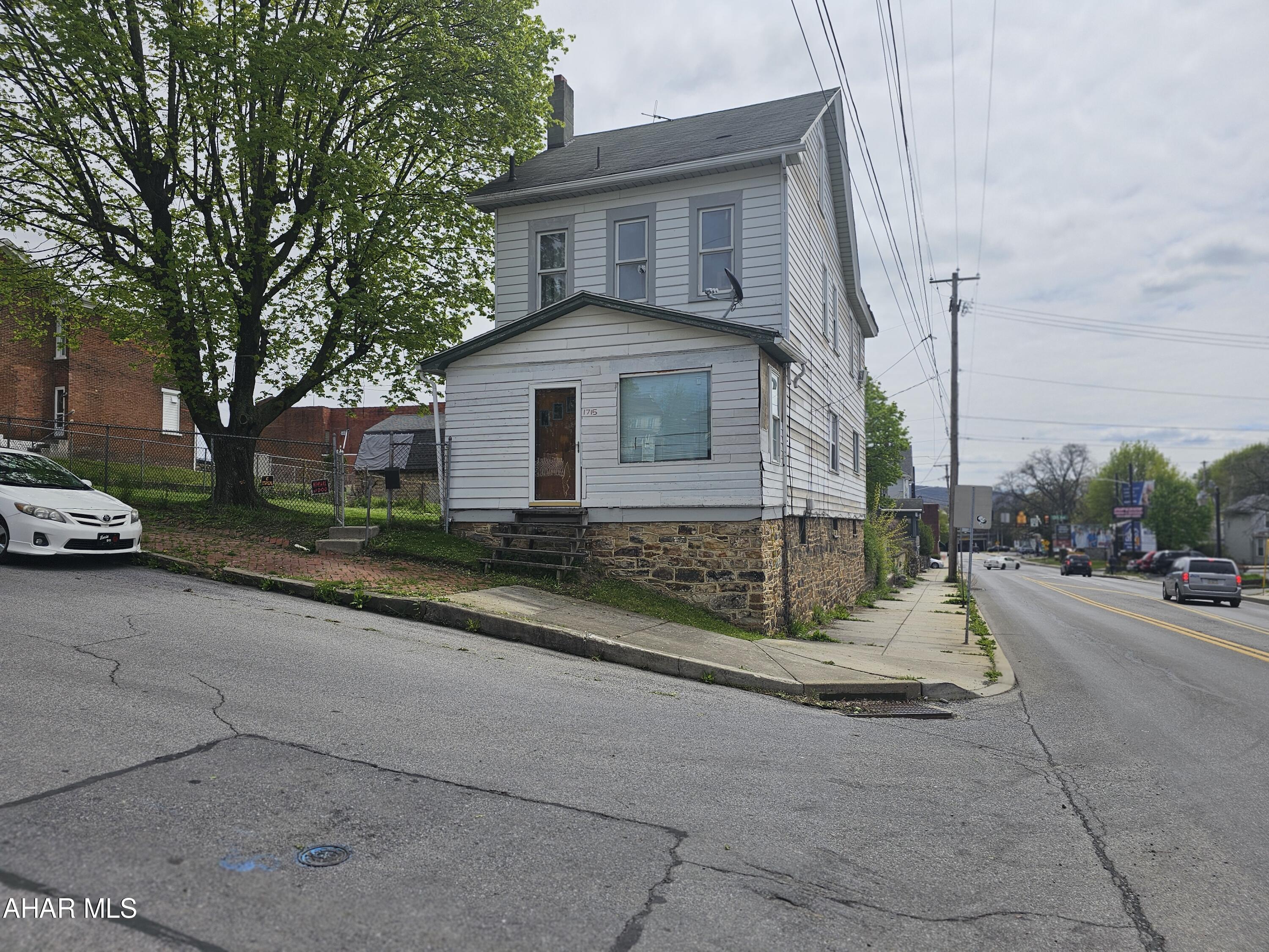 Large 2 story home with 3 bedrooms and a full bath in need of some TLC. Home has large living spaces .Yard is completely fenced in. Great for investors or flippers. Schedule a tour today.