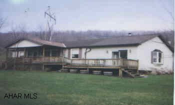 SPACIOUS 1 STORY HOME ON PRIVATE 2 ACRES, EAT-IN KITCHEN, LIVING RM W/FIREPLACE, DINING RM, 2 BEDROOMS, 3 BATHS, 16X36 INGROUND POOL.