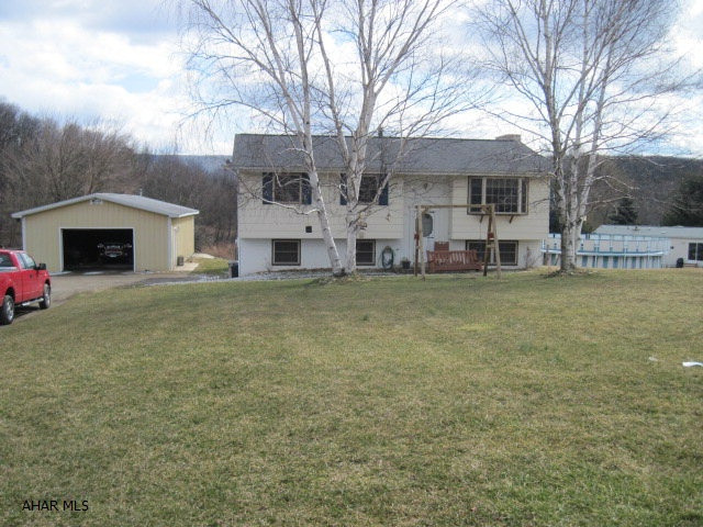 Must See!! Home is updated with new windows, bathrooms, flooring, carpeting, plumbing, wiring, central vac. Roof approx 15 yr old. Beautiful piece of property all cleared 1.5 acre. Basement completely finished. Woodburning fireplace in Family Room. Above ground pool, large detached garage 48' x 24'. Bathroom rough in in garage.
