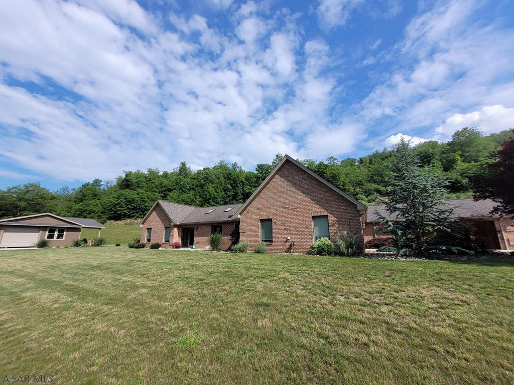 Absolutely beautiful brick home with all the outdoor entertaining you can imagine! Built in 2009 this home doesn't spare any expense. Heated tile flooring, storage & closets everywhere, large open kitchen-dining-living room area with stone fireplace and so much more. Two bonus rooms have endless possibilities to suit your needs. A large master bedroom with 2 WIC, & a private entrance to the pool sure will help you wind down. Outside the inground salt water pool is sure to keep you cool! Entertaining with an outdoor kitchen makes summer so enjoyable! If that is all not enough, there's a detached garage for hobbies, tractors, or anything you can imagine! The home is landscaped and hardscaped with little maintenance required. Call listing agent for your tour today.