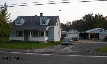 Nice 1 1/2 story, 2-BR home on 2 acres.