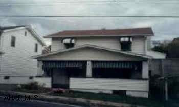 Fenced back yard, small above ground pool, covered patio Fenced back yard, small above ground pool, covered patio
