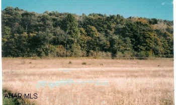 3.67 Acres, great views Perk approved, septic system plans available.