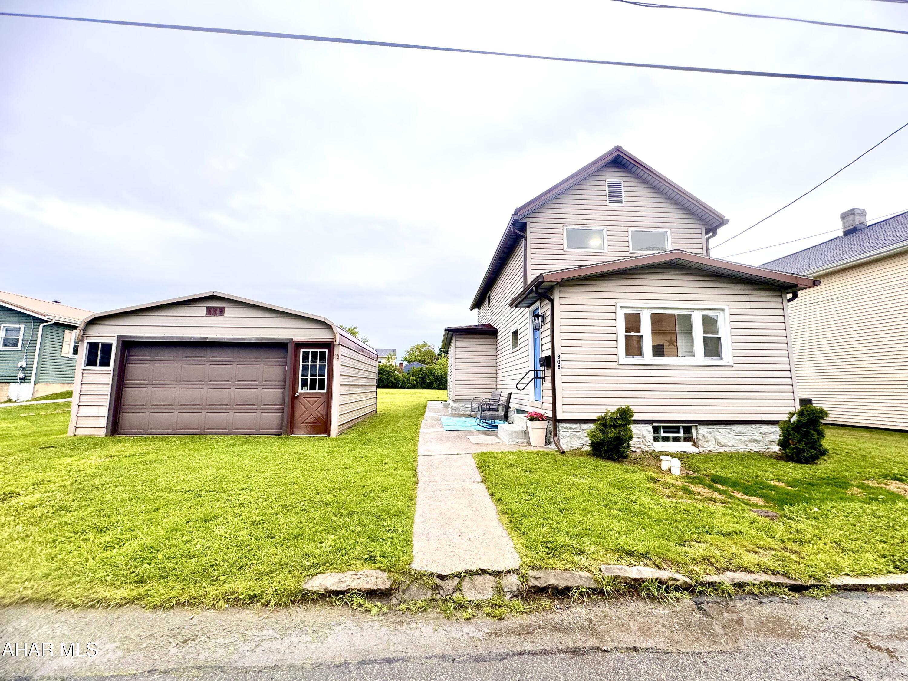 Tucked back into one of Galltizin's Quietest neighborhoods sits 308 Maxwell St. This adorable house is ready for it's next owners.  It has been completely remodeled from top to Bottom.  The Open concept layout provides for a view from the front of the house, to the back with no obstructions! There is also a mudroom/Laundry room at the back of the first floor. Upstairs you'll find three rooms and a Bathroom with stunning tile work. The open hallway makes for a very airy feel to the upstairs as well.  Outside is an oversized garage, and Lots of space with a flat back yard!   Don't miss this little gem! Call today for your tour!