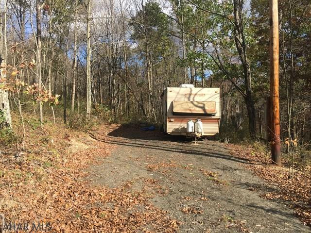 This property would make a great location for a full time residence or weekend getaway. Located minutes away from Shawnee Lake and PA State Game Lands. Mobile Trailer on property can stay or be removed. Has road frontage and electric on site.