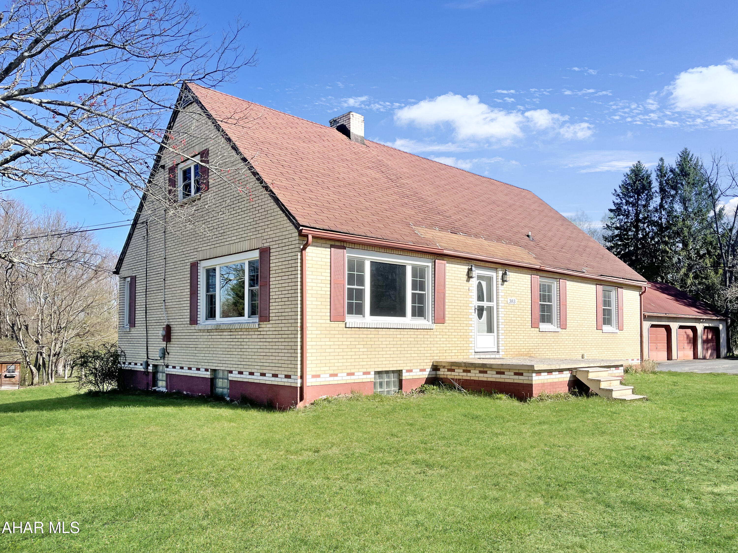 BACK ON MARKET w/ $15k PRICE REDUCTION TO ASSIST W/ ANY DESIRED REPAIRS & UPDATES. Welcome to 383 Griffith Ave in Jackson Township, Central Cambria School Districts. This cape cod style home sits on a corner lot on approximately 1.36 acres in a peaceful neighborhood. Updates throughout the home include, newer windows, kitchen, plumbing, doors, trim, & so much more! The first floor of the home features an open floor plan w/ a foyer, living room, dining room, mudroom, kitchen, full bath, guest bedroom, & a HUGE master bedroom w/ his & her closets. Upstairs is another updated full bathroom & two large bedrooms w/ spacious closets. The basement runs the length of the home & is perfect for storage. The exterior of the property features a 3 car detached garage w/ above storage, shed, playground, & so much more! Call today!
