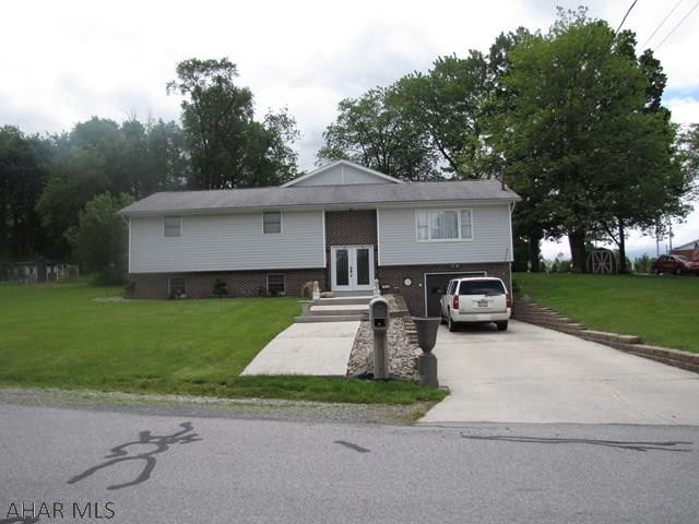 Beautiful split level home with a new addition with a heat pump. remodeled kitchen and open concept living area, 3 bedrooms 2 1/2 baths on main level. Lower level offers a bonus room that could be an additional bedroom, office, or a game room. Great location a must see!