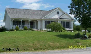 Raised Ranch with additional 3 car garage.