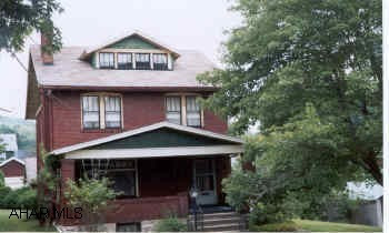 2.5 Story Brick Needs Updated Solidly Built - Lots of Potential - Double Lot