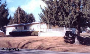 2 BEDROOM MOBILE HOME ON FOUNDATION ON 1.15 ACRES OF GROUND (NO LOT RENT).