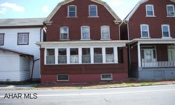 3 story red brick with 2 car garage, 4 BR, 1.5 baths, kitche, LR, Din Rm with sunporch Nice property 3 story with off street 2 car garage.  4 BR, 1.5 baths, kitchen, LR, Din Rm. with sunporch.