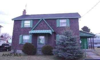 TWO STORY FRAME, TWO BEDROOM HOME HAS  BEAUTIFUL CHARACTER, HARDWOOD FLOORS, VERY QUAINT INSIDE