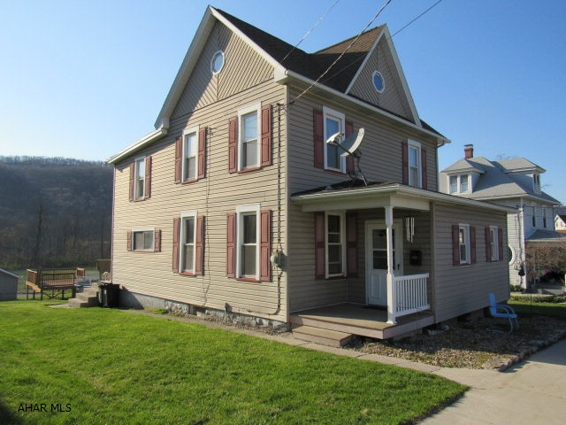 Very nice home in the heart of of Roaring Spring providing you semi-privacy but close proximity to everything the borough has to offer. This 3BR, 1 1/2 bath home has beautiful oak kitchen cabinetry, is bright and spacious through out with lots of storage for everyone.  There is composite decking on the front porch, a 12'7x24'8 1 car garage, and a 16'3x 12'3 deck, 8'x16' Concrete patio area for entertaining friends and family overlooking the mountains in the background. The above ground pool with the deck is awesome too! Hurry! So you can get ready to enjoy the pool this summer!