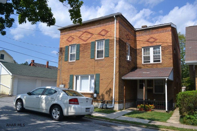 Solid brick duplex in super neighborhood!