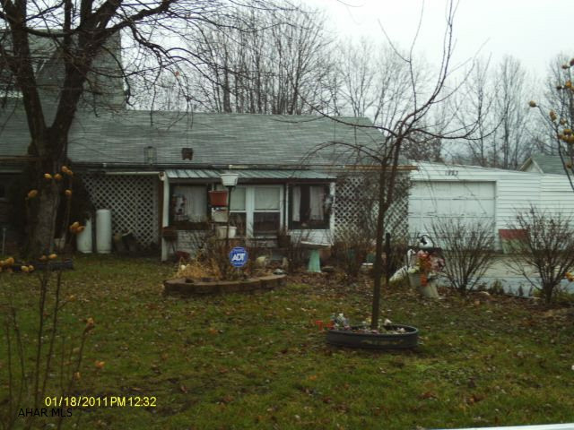 1-1/2 Story, 3 Bedroom, 1-3/4 Bath, Large Rooms, Newer Windows, Vinyl Siding, 1-Car Garage, Carport, Workshop, Security System.