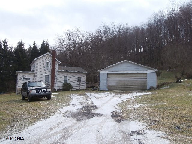 Large lot - some updates. Two car detached garage. House is currently rented - tenant to move end of May. House has newer shingle roof. 100 amp breakers. Furnace is newer.