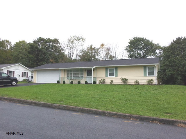 3 bedroom frame rancher with family room. Garage was converted to workshop and family room. No basement. Seller to make allowance or install Trane Heat Pump.