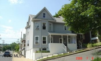 Rent Money is Spent Money - This charming home 1.5 mi from Campus is the perfect way to own a home for less than what you pay rent. 3 large BR's with custom closets, many updates include bath, kitchen, windows, siding, roof, breakers and sidewalk. Rent Money is Spent Money - This charming home 1.5 mi from Campus is the perfect way to own a home for less than what you pay rent. 3 large BR's with custom closets, many updates include bath, kitchen, windows, siding, roof, breakers, and sidewalk. Cozy front porch and rear patio nook. No yard or shrubs to maintain . . . JUST MOVE IN! only $39,900.  Call Janet Burley 814-942-3112