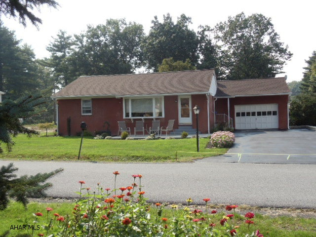 Nice hardwood floors, immaculate 3 bedroom 1-story brick, updated kitchen & bath, 2-car heated garage.  #J-088