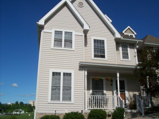 Beautiful end unit Townhouse. 4 finished floors, eat-in kitchen with corian countertops, Island, walk-in pantry. Master bedroom with master bath and walk-in closet. 3rd floor finished bedroom with private bath, finished basement, play room or family room, laundry, storage. Detached 2 car garage, fenced yard and deck. New hot water heater.