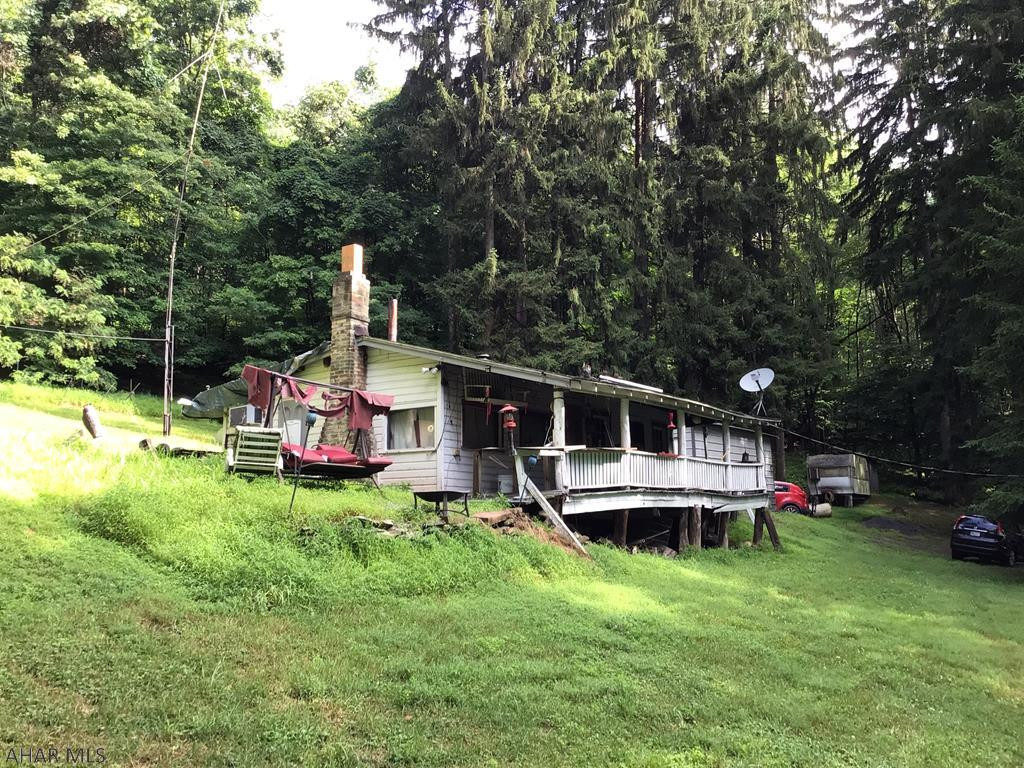 Private 26 acres close to Blue Knob!  Perfect spot to put your own get a way but still close to everything.  Power to property and newer well but septic condition and location is unknown and a large 20'x25'garage.