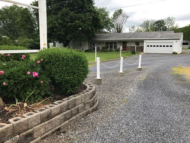 Live for free and generate income month after month with this turn key property. A spacious one level home with one bedroom (with possibility of two bedrooms), living room, dining room and family room with bar adjacent to lovely screened in porch and also walk out to private patio with hot tub. Three apartments generating approx. $1550.00 monthly with long term renters. There are four additional guest rooms each with full bathroom that could double the income. Incredible value. Profit and loss statement attached. All furniture and appliances included. See attached profit and loss and expense statement.