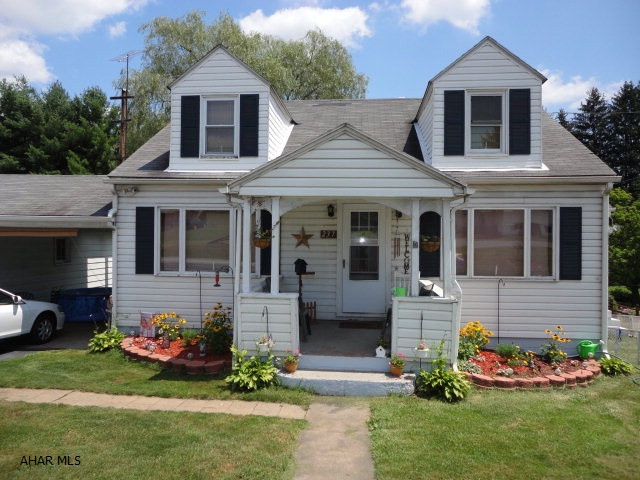 This cute cape code has a 1st floor master bedroom, spacious bath and original hardwood floors. Enjoy the sun porch off of the kitchen in the mornings and the covered breezeway for your out door cooking. New sewer line has been installed from the main stack out.
