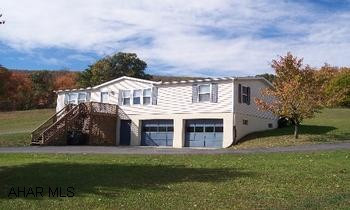 Well kept 3 bedroom, 1.75 bath ranch style home with screened-in porch, basement, and 2 car integral garage on 1+ acre!  Open floorplan, separate dining area, large closets, large master bath, PLUS basement has family room potential.  Stunning views, paved circular drive, just 2 miles from town!(DIRECTIONS:  Go West onto Pitt Street, turn Right onto Cumberland Road.)